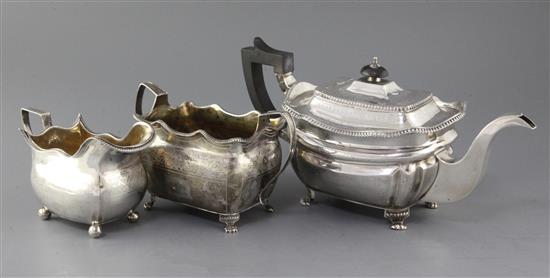 A matched George III Irish silver three piece tea set, gross 36.5 oz.